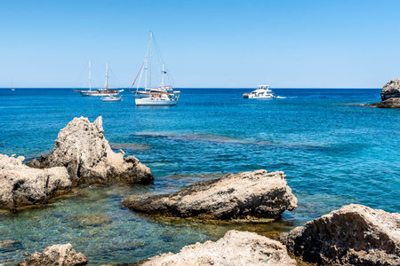 Yachts on beautiful Kallithea beach, Rhodes Islandの写真素材