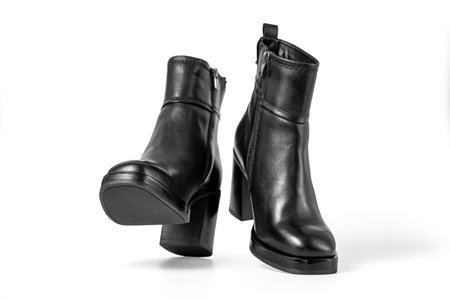 Female elegant high heeled leather ankle boots. Isolated on a white background with clipping path includedの写真素材