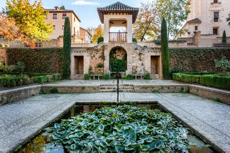 Alhambra - pool and altan. Alhambra Palace gardens, UNESCO World Heritage Site, Granada, Andalucia,...
