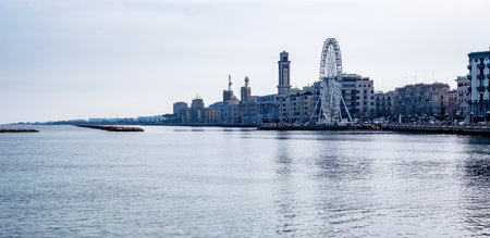Panorama of Bari, Puglia or Apulia, southern Italy with Mediterranean Sea, Ferris wheel on the seafront promenadeの写真素材