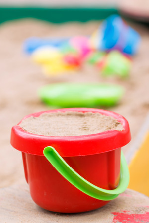 a bucket of sand in the sandboxの写真素材