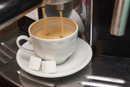 Making coffee in a carob coffee machineの写真素材