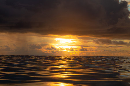 Beautiful sunset over the sea in the tropics. The sun goes down.の写真素材