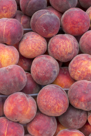 fresh red peaches abstract fruit colorful pattern texture backgroundの写真素材