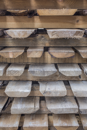 pile of wooden boards pattern texture backgroundの写真素材