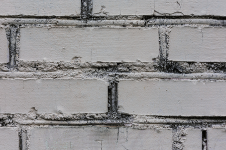 white rough stone bricks wall pattern texture backgroundの写真素材