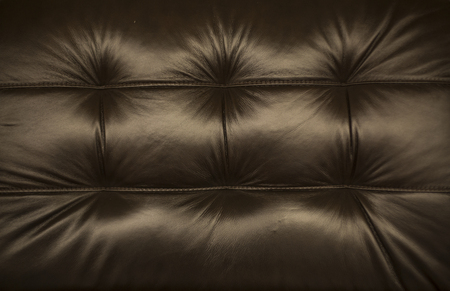 Natural brown leather texture background. Abstract vintage cow skin backdrop design.の写真素材