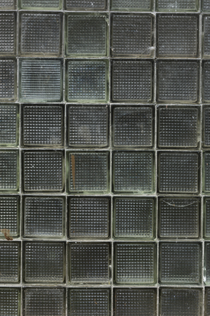 old green glass block wall background abstract seamles vertical texture structure backgroundの写真素材