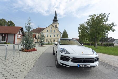 Slovenia ljubljana, 31 August 2019 - Front side of white SUV Porsche Cayenne Coupe Turbo S from Stuttgart during test drive close-upのeditorial素材