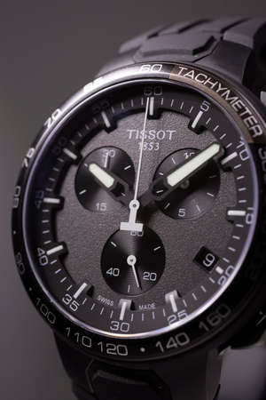 Le Locle, Switzerland 15.01.2020 - Tissot man watch stainless steel case, black clock face dial, sport rubber strap, swiss quartz mechanical watch isolated, swiss made manufactureのeditorial素材