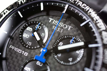 Le Locle, Switzerland 15.01.2020 - Tissot man watch stainless steel case, black clock face dial, sport rubber strap, swiss quartz mechanical watch isolated, swiss made manufactureのeditorial素材