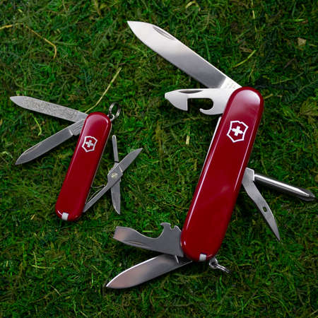 Ibach, Switzerland 02.02.2020 - Two opened Swiss Army knife Victorinoxのeditorial素材