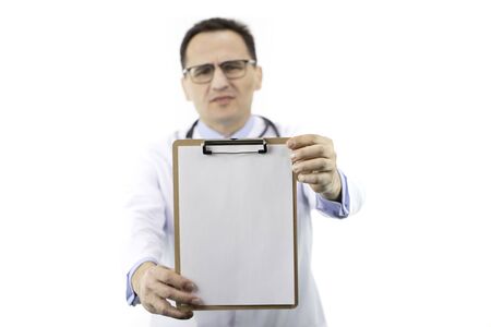 Upset doctor holding blank clipboard, copy space for text. Incidence statisticsの写真素材