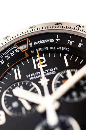 Biel, Switzerland 31.03.2020 - The close up of Hamilton man watch stainless steel case black clock face dial swiss quartz mechanical watch isolated swiss made manufactureのeditorial素材
