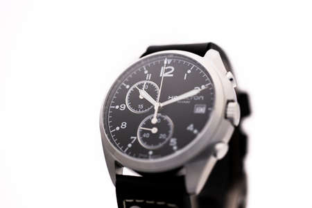 Biel, Switzerland 31.03.2020 - The close up of Hamilton man watch stainless steel case black clock...