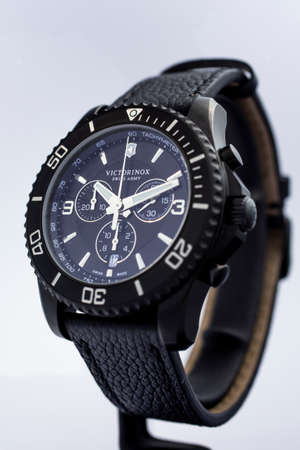 Ibach, Switzerland 31.03.2020 - The close up of Victorinox man watch stainless steel case leather...
