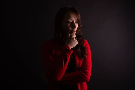 Woman making a difficult decision. Life problems. Human emotional portraitの写真素材