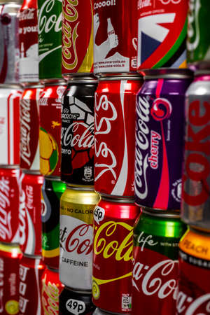 Atlanta, Georgia, USA April 4, 2020: Arabic Coca Cola logo on red aluminum can on background of many multicolored aluminum cans of Coca Cola selective focus. multilingualism, favorite taste conceptのeditorial素材