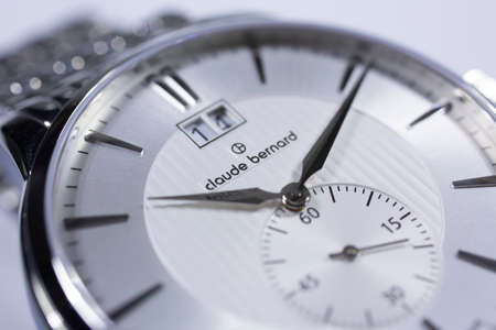 Geneve, Switzerland 01.10.2020 - Claude Bernard swiss made watch close up detail. date indication 14. valentines day concept Logo Claude Bernard Swiss watchmaker, watch manufactory brandのeditorial素材
