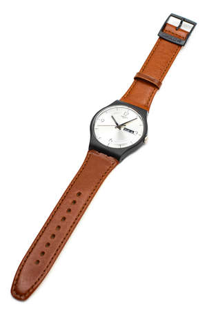 Rome, Italy 07.10.2020 - Swatch classic design swiss made mechanical watch isolated on white background. black plastic case date TUE 8, stylish mens accessory. brown leather strap. Swatch Groupのeditorial素材
