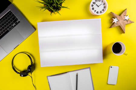 blank Illuminated lightbox no text on modern yellow office desktop. Vintage form of ads, before Internet age, unplugging from technology, digital detox, technology break, offline, digital cleanseの写真素材