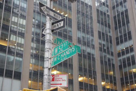 New York City, NY, USA 2.09.2020 - Sixth ave and West 52 crossroads street sign, Manhattan New York...