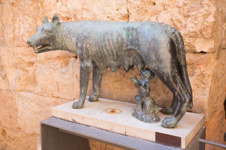 Tarragona, Spain, March 1, 2020 - Statue of She-wolf, Loba romana, one of sculpture brothers was stolen. concept of theft in tourist areas, security systems. Watch your stuffのeditorial素材