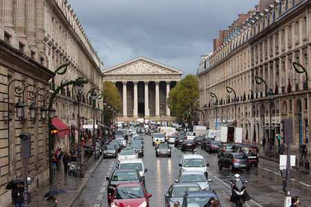 Paris, France, 1.11.2019 - View of busy rainy Royal Street and Madeleine Church, La rue Royale. center of Paris with luxury boutiquesのeditorial素材