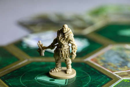 Roseville, MN, USA, 02.04.2021 - Fallout Board Game Plastic Enemy Figure on Map Tiles. four players Home fun Based on strategy post-apocalyptic computer game Falloutのeditorial素材