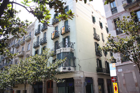 Barcelona, Spain, 1.09.2020 - Flags of Catalonia on balcony of residential building on carrer Gran de Gracia. independence of Catalunia concept, national self-determination in European Unionのeditorial素材