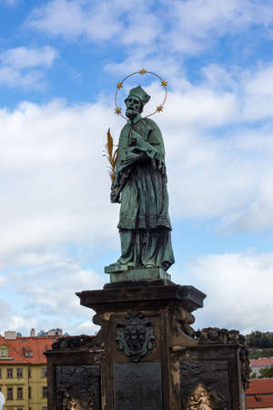 Prague, Czech Republic, 2.09.2020 - famous Statue of St. John of Nepomuk at Charles Bridge. Tours of Old Prague, travel concept, heritage of medieval Europeのeditorial素材