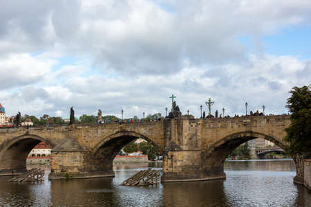 Prague, Czech Republic, 2.09.2020 - View of Charles Bridge on Vltava River. Tours of Old Prague, travel concept, heritage of medieval Europeのeditorial素材