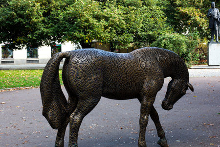 Pilsen, Czech Republic, 1.09.2019 - Modern bronze horse statue on citys green boulevard, walking area Smetanovy sady (Smetana Park) municipal park. concept of urban greeningのeditorial素材