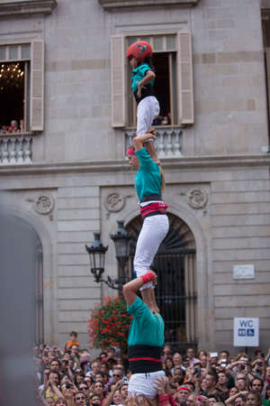 Barcelona, Spain, September 22 2019 - Vilafranca castellers team Castells performance during Fiesta de la Merce. castell is human tower built traditionally on festivals in Catalonia. UNESCO Heritageのeditorial素材