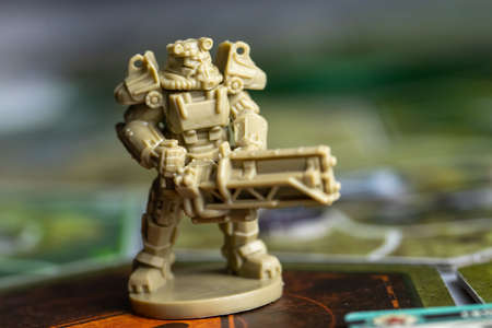 Roseville, MN, USA, 02.04.2021 - Fallout Board Game Plastic Enemy Figure on facedown Map Tile...