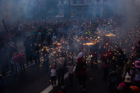 Barcelona, Spain, sept 22, 2018 - Traditional Correfoc and costumed devils procession on Via Laietana during festivities La Merce festival.のeditorial素材