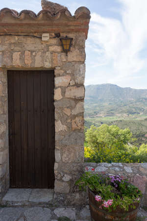 Siurana, Tarragona, Spain, May 1, 2020 - old home door in medieval village. most photogenic place. Welcome to Catalonia concept copy space. Catalan History of Middle Ages. heritage.のeditorial素材