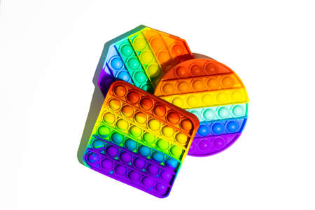 Pop It silicone sensory anti-stress Fidget kid toys colorful rainbow game isolated on white...