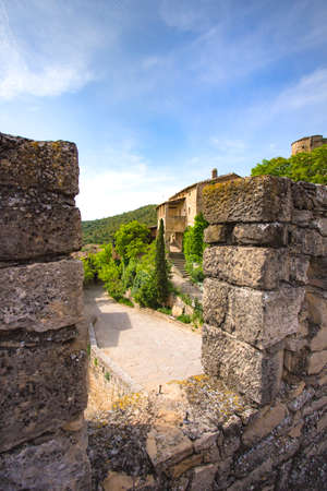 Foradada, Spain, May 1, 2020 - Castle of Montsonis in Lleida province, Catalonia. old medieval architecture, historical heritage inhabited castle, defensive fortification, touristic Concept Copy spaceのeditorial素材