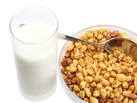 Fragment of milk's glasses with bowl cold cereal flakes. Isolated