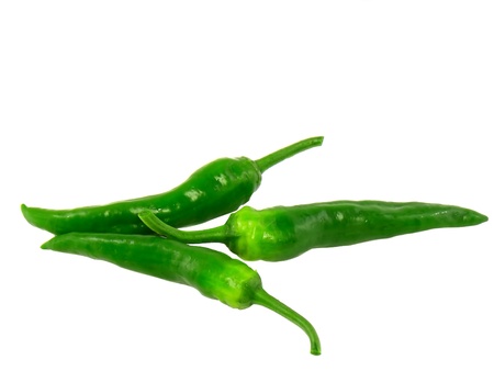 Green chili peppers. Isolated over whiteの写真素材