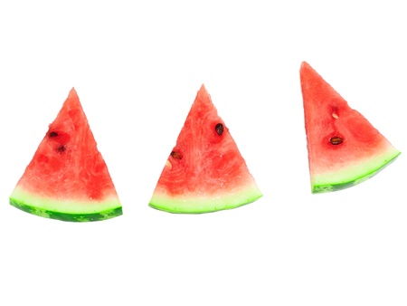 Slice of juicy watermelon. Isolated over white.