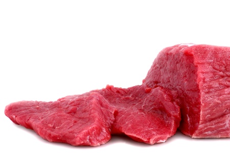 Cut of  beef steak on white. Isolated.の写真素材