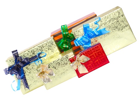 Pile of Christmas and New Year gift boxes. Isolated over white background