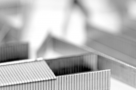 Stack of metal staples. Isolated on a white background.