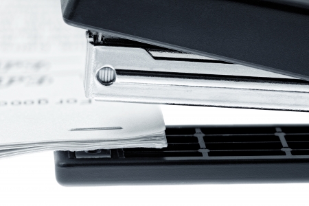 Stapler attach a documents. Isolated on a white background.の写真素材