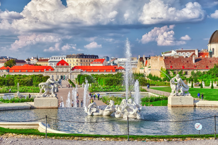 VIENNA, AUSTRIA-SEPTEMBER 10, 2015: Lower Belvedere. Main palace complex Belvedere, fountain and walking people.Vienna. Austria.のeditorial素材