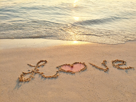 Inscription "LOVE" in the sand on a tropical island,  Maldives.の写真素材