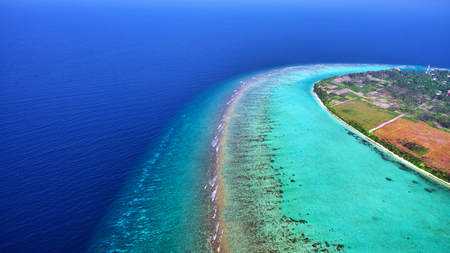 Beautiful tropical island from above. Maldives, whole island Thoddoo.の写真素材
