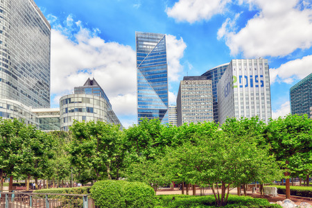 PARIS, FRANCE - JULY 06, 2016 :La Defense, Business Quarter with businessmen in the streets, area of Paris,  French financial center with skyscrapers and modern buildings.のeditorial素材